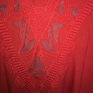 loose fitting orange blouse